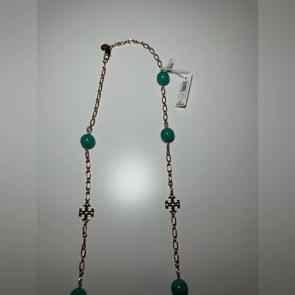 Tory burch gold and turquoise necklace. Brand new with tag and dust bag …